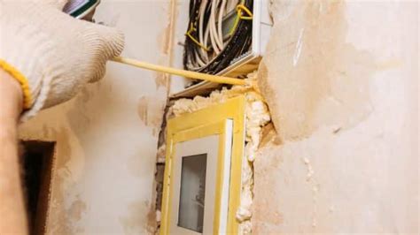 spray foam over electrical wires